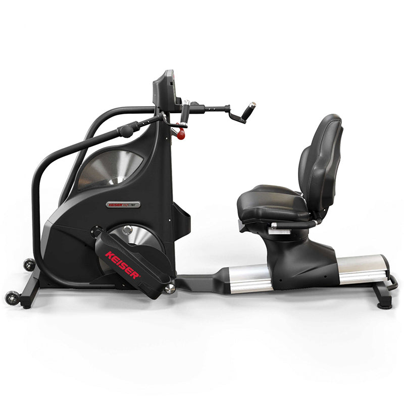 Keiser M7i Total Body Recumbent Stepper exercise bike. Full view of the bike from the left side view on a white background