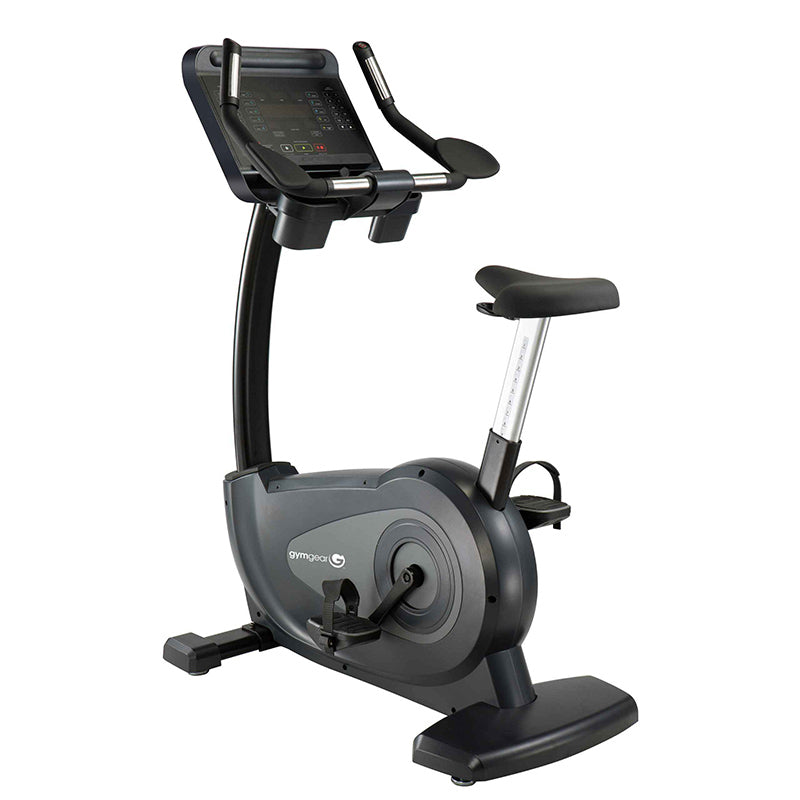 Gym Gear C97 Upright exercise bike with digital display on a white background