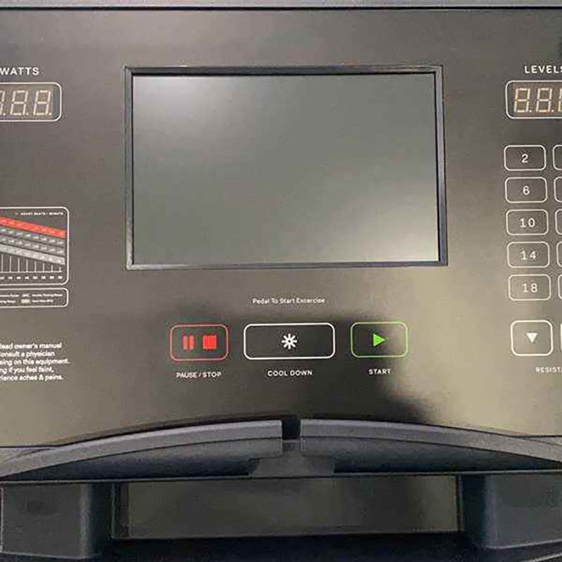 Control panel of a Gym gear C98s Upright exercise Bike with digital display and buttons.