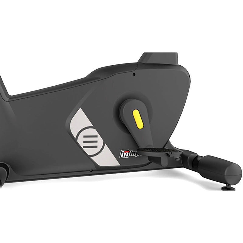 Impulse Encore ECU7 Upright Exercise Bike. Close-up of black exercise bike with peddles with  on a white background