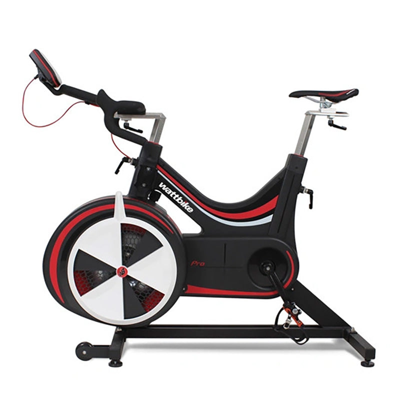 Wattbike Pro/trainer exercise bike in Black and red from a side view on a white background