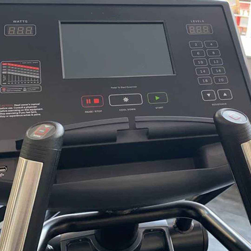 Close-up of a Gym Gear X98s Cross Trainer, control panel with digital display and buttons.