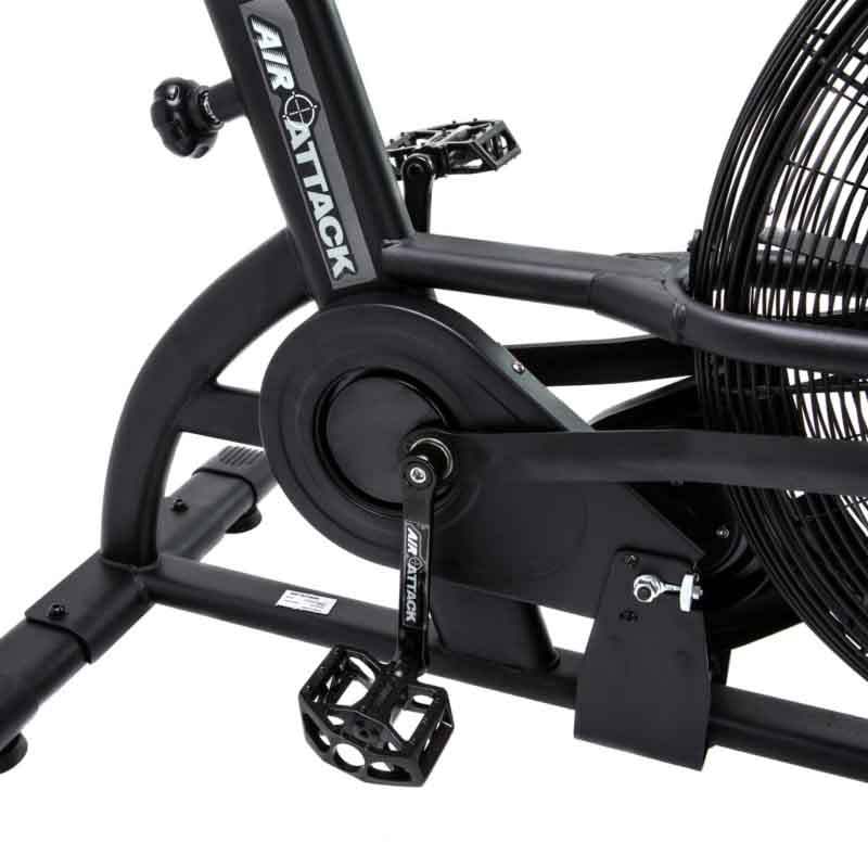 Attack Fitness Fan Air Bike in Black on a white background. Close up of the pedals