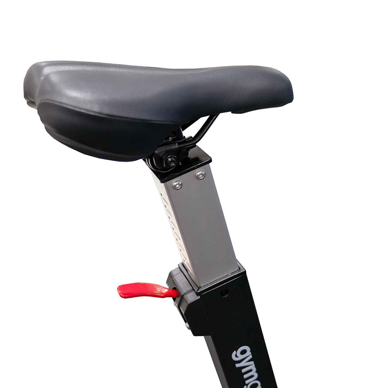 Close-up of the bike seat and the adjustable seat lever in red and black