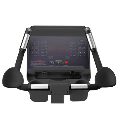 Close-up of the exercise bike with a digital display in black on a white background