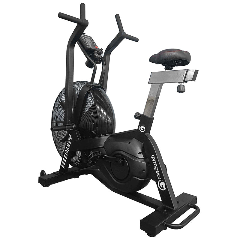 Gym Gear Hurricane Air Bike exercise bike in black, full view from a back angle to the left on a white background
