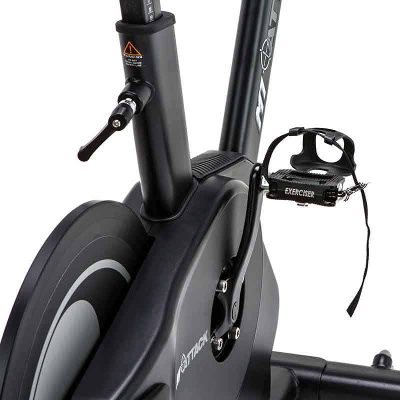 Attack Fitness Spin Attack M1 Indoor Cycle exercise bike in Black, Close-up of a stationary bike pedals 