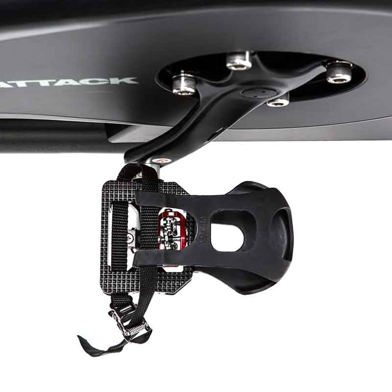 Close-up of a black bike pedal from a top view on a white background