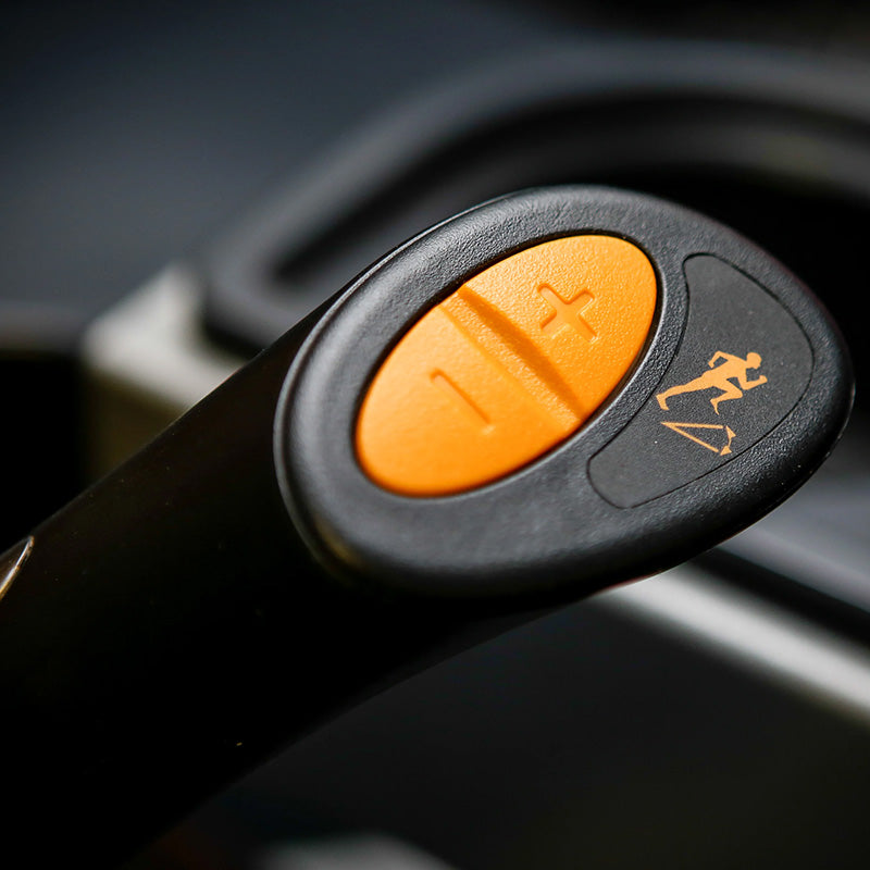 Impulse RU700 Upright exercise Bike Close-up of the handle with speed control showing the plus and minus buttons