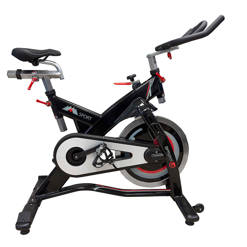 Gym Gear Sport Indoor Cycle exercise bike in black with red accents from a side view