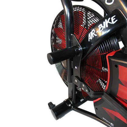 Close-up of an air bike with red and black design on a white background