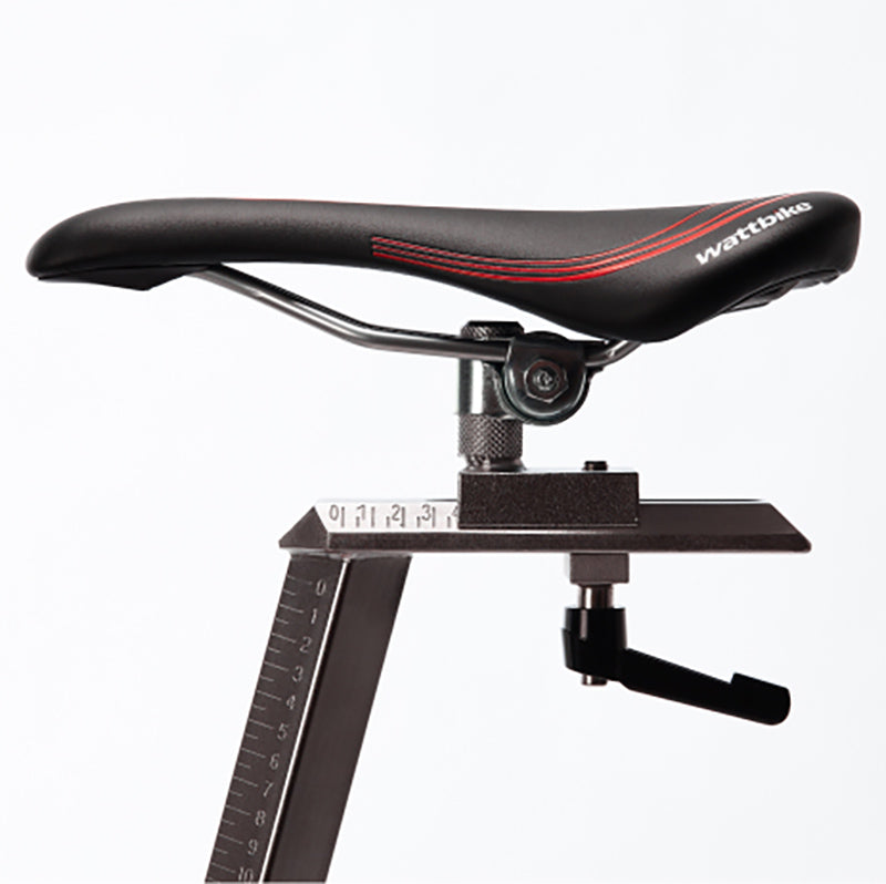 Close-up of the Bicycle saddle with adjustable mechanism on the Wattbike Pro/trainer exercise bike in Black and red on a white background