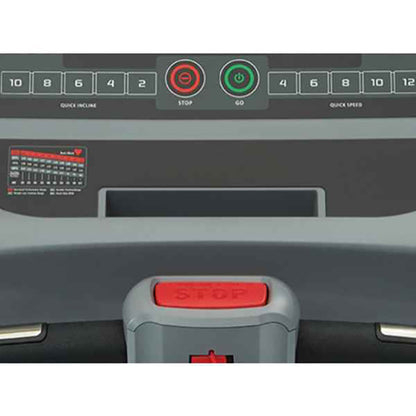 Control panel of a Gym Gear T98 Treadmill with buttons and display.