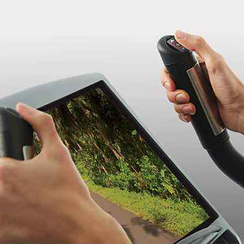 Person using the thermal handle device on the Gym Gear C98e Upright exercise Bike. hands are pushing the speed adjustments